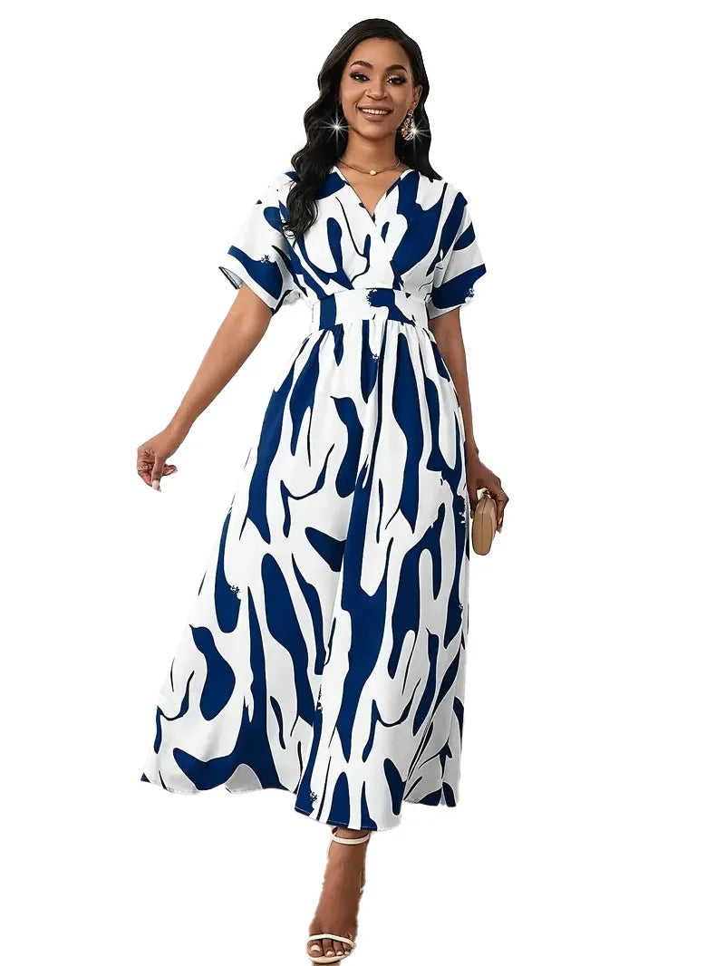 Woman wearing a blue and white patterned dress on a white background