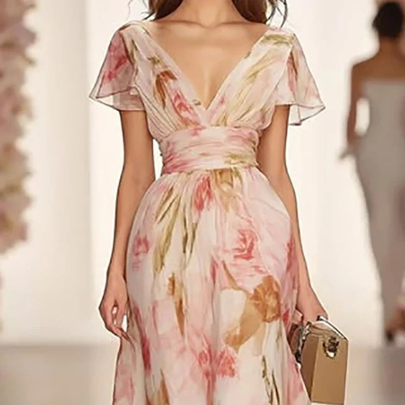 Woman wearing a floral dress with a blurred background