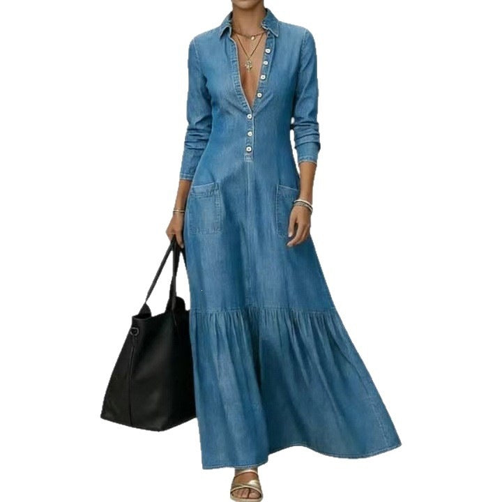 Woman wearing a blue denim dress holding a black handbag on a white background