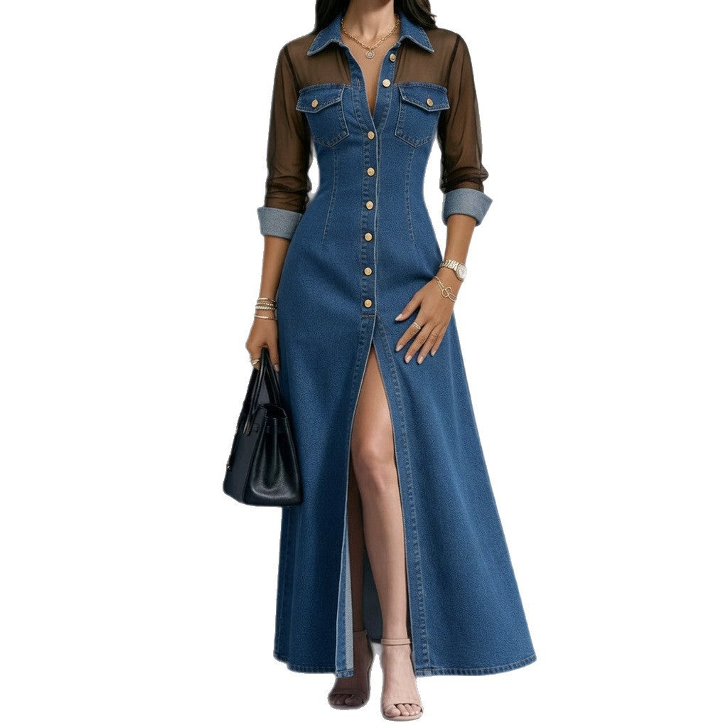 A woman modeling a long blue denim dress with a brown sheer long-sleeve overlay and gold-tone buttons, holding a black handbag against a plain white background.