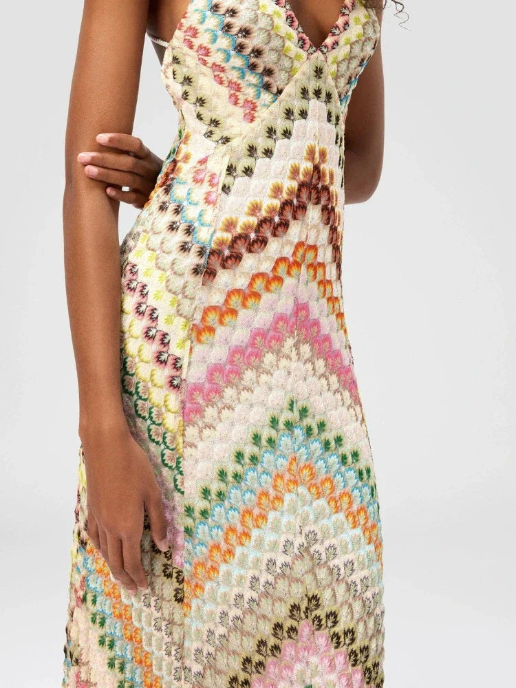 Multicolored patterned dress on a white background