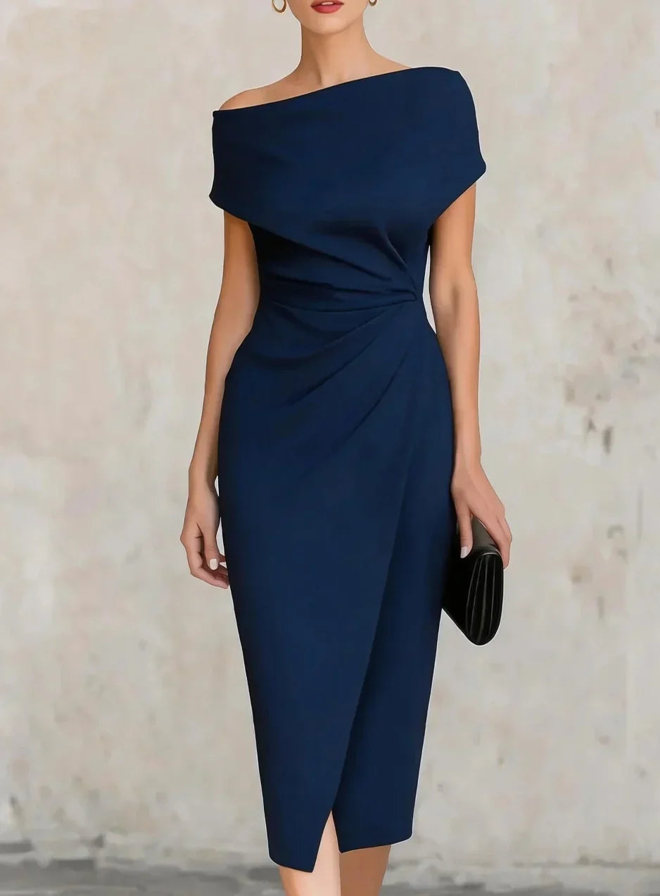 Navy blue off-shoulder dress worn by a model against a neutral background