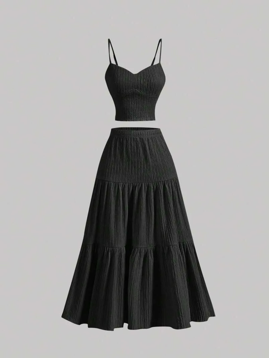 Brown two-piece outfit with a top and tiered skirt on a light gray background